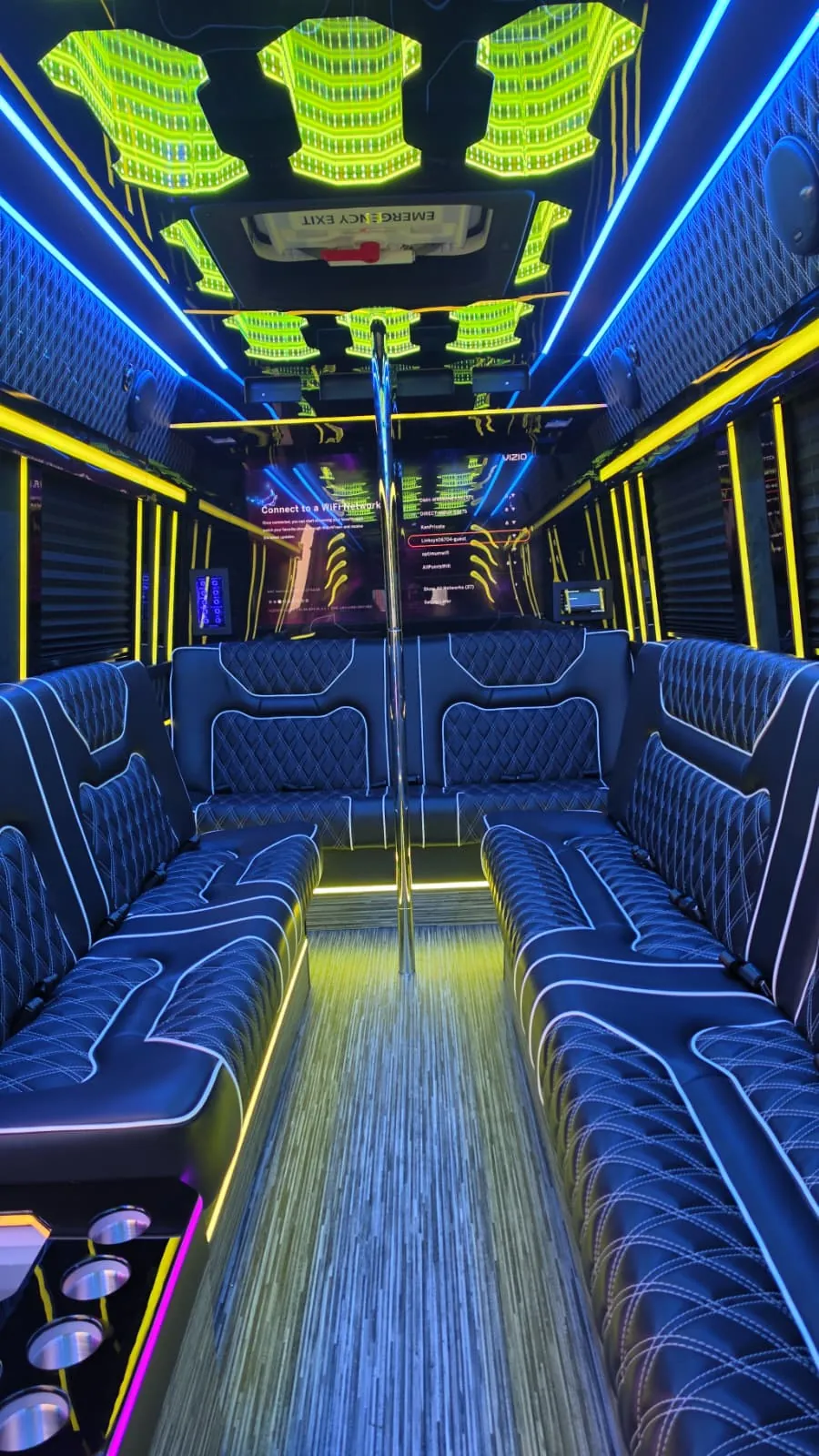 Limo Sprinter interior with perimeter lounge seating and ambient lighting